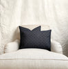 dotted black pillow