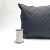 dotted black pillow