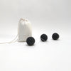 felted wool balls (in cotton bag)