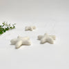 set of 3 felted wool stars (in cotton bag)