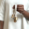 set of three brass bells