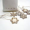 bag of wooden snowflakes