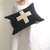 applique wool pillows. cream and black cross