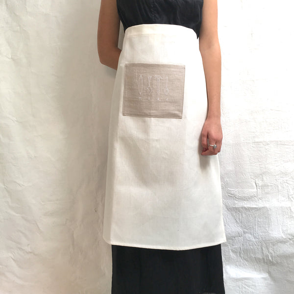 half apron with 'make' pocket