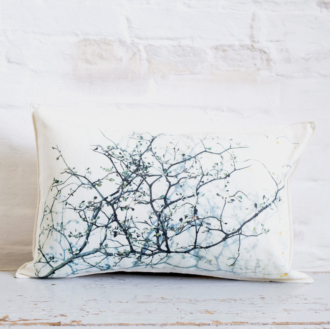 branch and text pillow