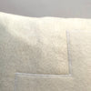 applique wool pillows. cream cross
